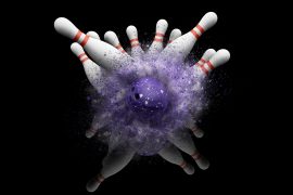 3D render of a bowling ball smashing into skittles
